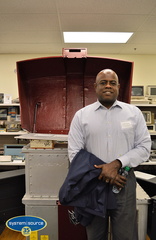 George Chambers in front of the Cray T94 Supercomputer